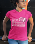 Pink crew-neck T-shirt with “Tigers Tackle Breast Cancer” football chest graphic