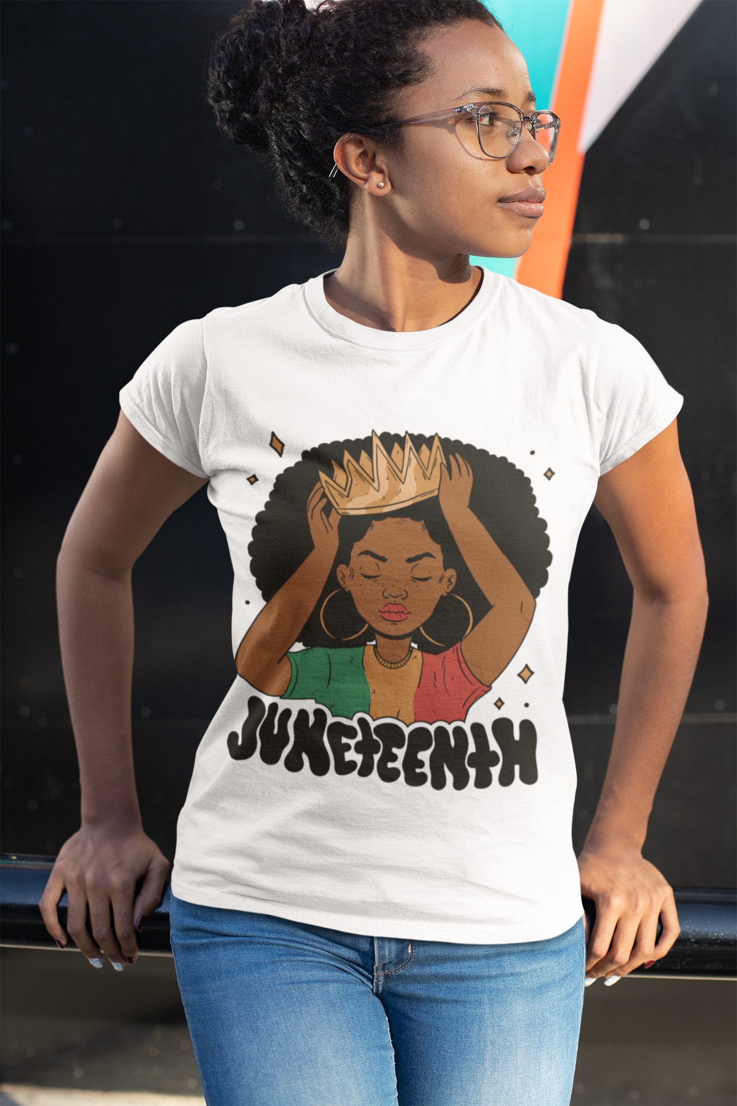 White Juneteenth Queen T-shirt on model with woman-in-afro hands graphic and Juneteenth text