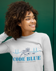 White long sleeve crewneck T-shirt with “CODE BLUE” wolf heart-rate graphic, on model