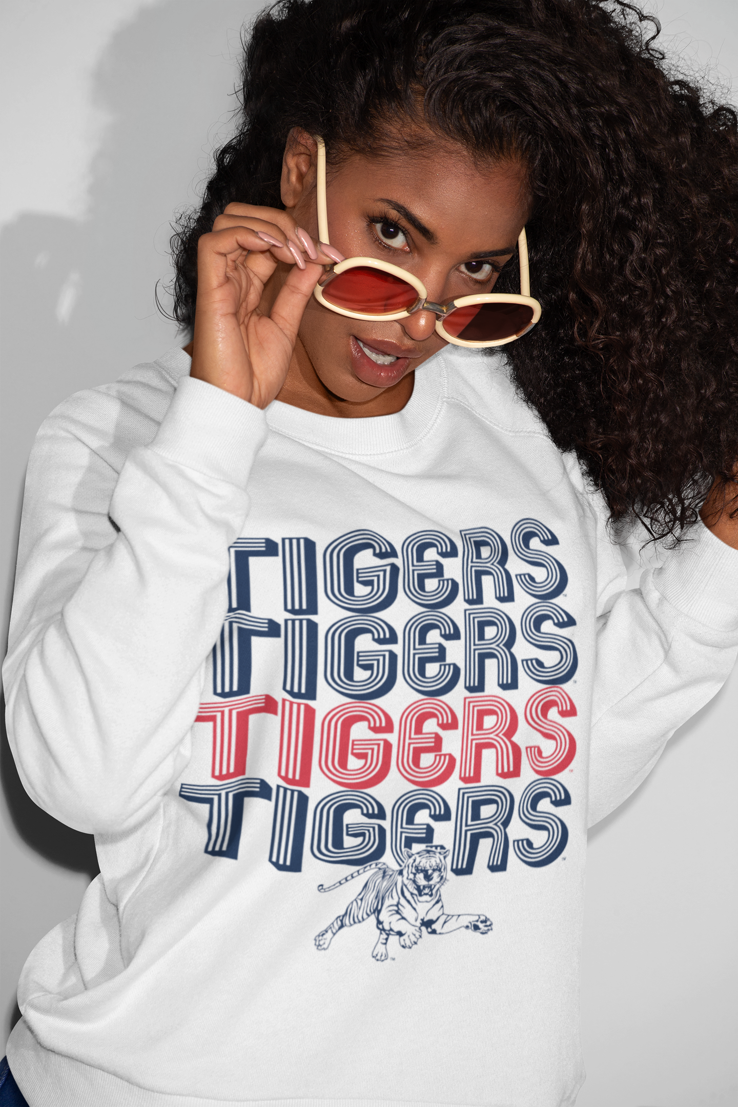 White crewneck sweatshirt with Tigers retro striped graphic and tiger mascot
