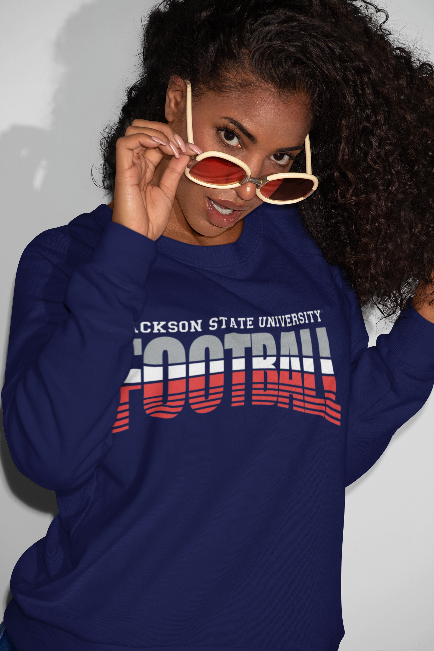 Navy crewneck football sweatshirt with stacked JACKSON STATE UNIVERSITY logo graphic