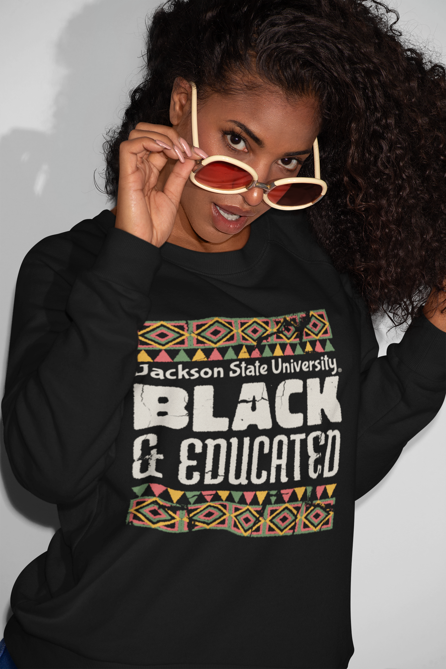 Black crewneck sweatshirt with “Jackson State University” Black &amp; Educated graphic