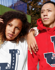 Two-tone view: white and red pullover hoodies with Tigers J front logos
