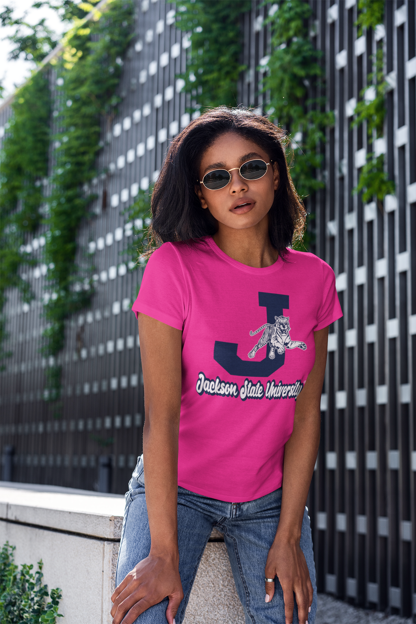 Pink short-sleeve crew neck T-shirt with leaping tiger and university text graphic