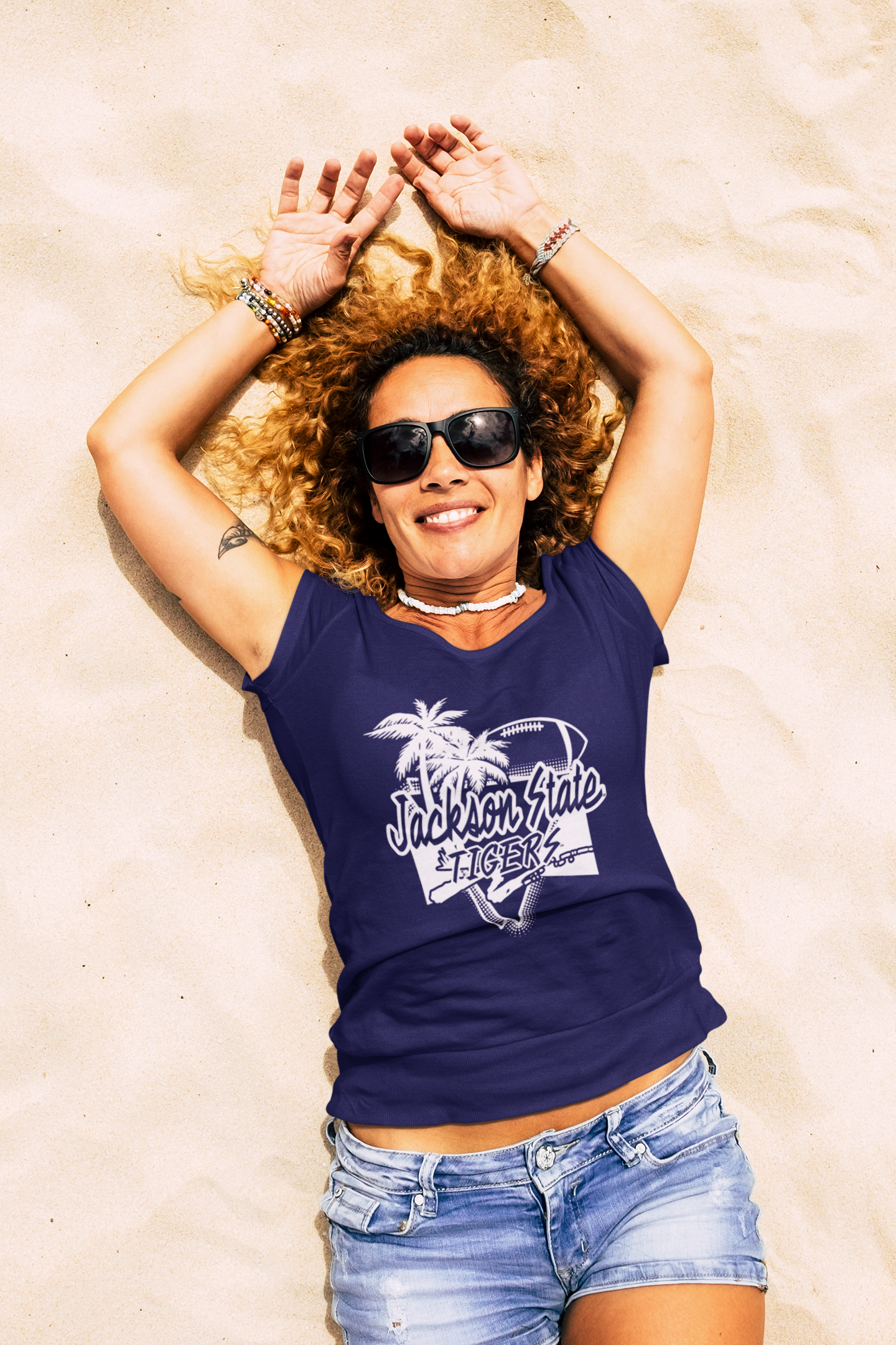 Navy blue short sleeve T-shirt with Tigers logo, worn with blue denim shorts