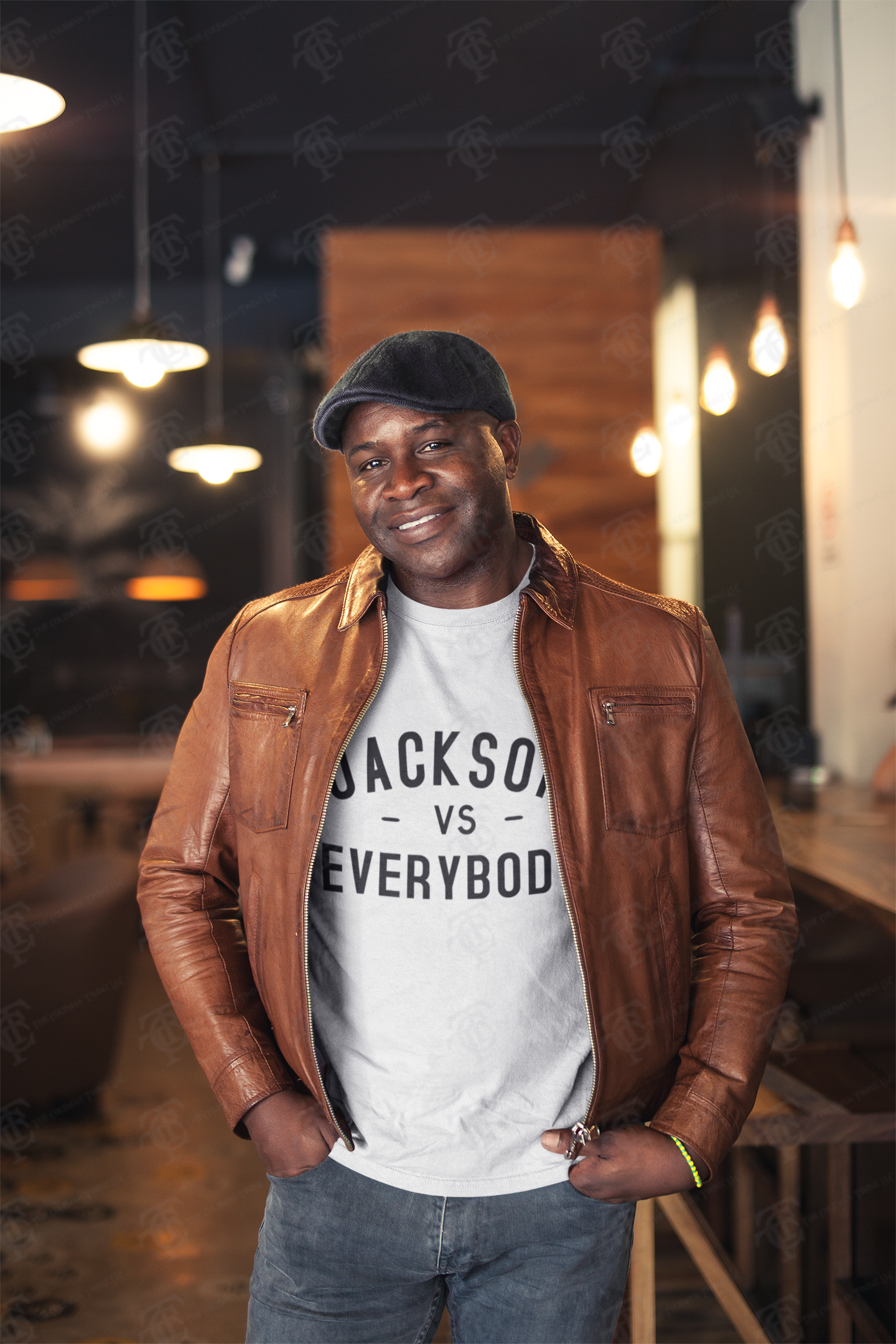White short sleeve crewneck T-shirt with black “JACKSON vs EVERYBODY” lettering.