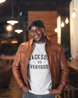 White short sleeve crewneck T-shirt with black “JACKSON vs EVERYBODY” lettering.
