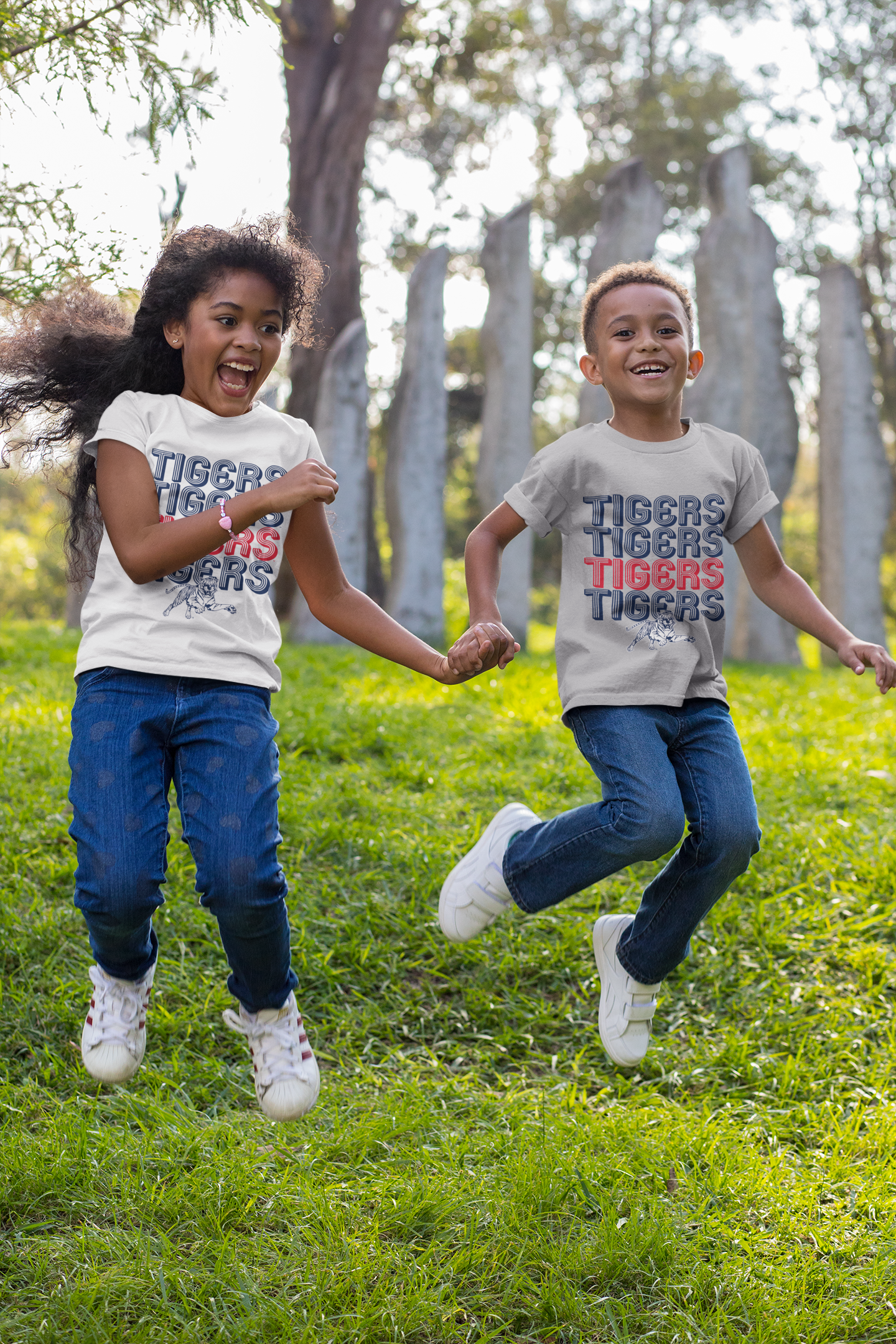 Athletic heather grey youth crewneck t-shirt with stacked TIGERS logo graphic