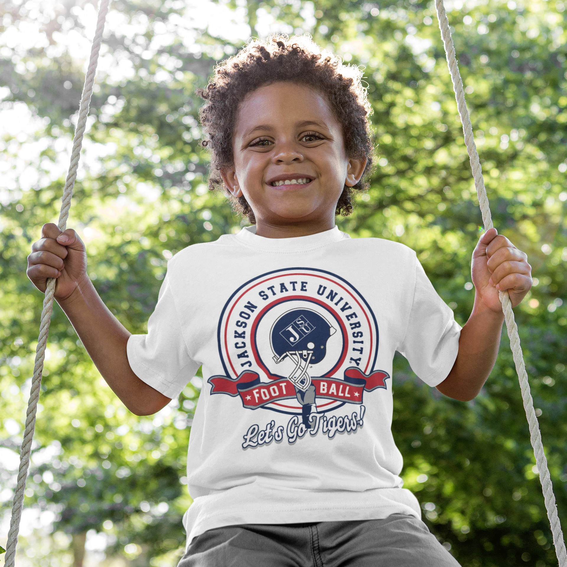 White youth T-shirt with circular JSU Tigers logo and 'Let's Go Tigers' graphic