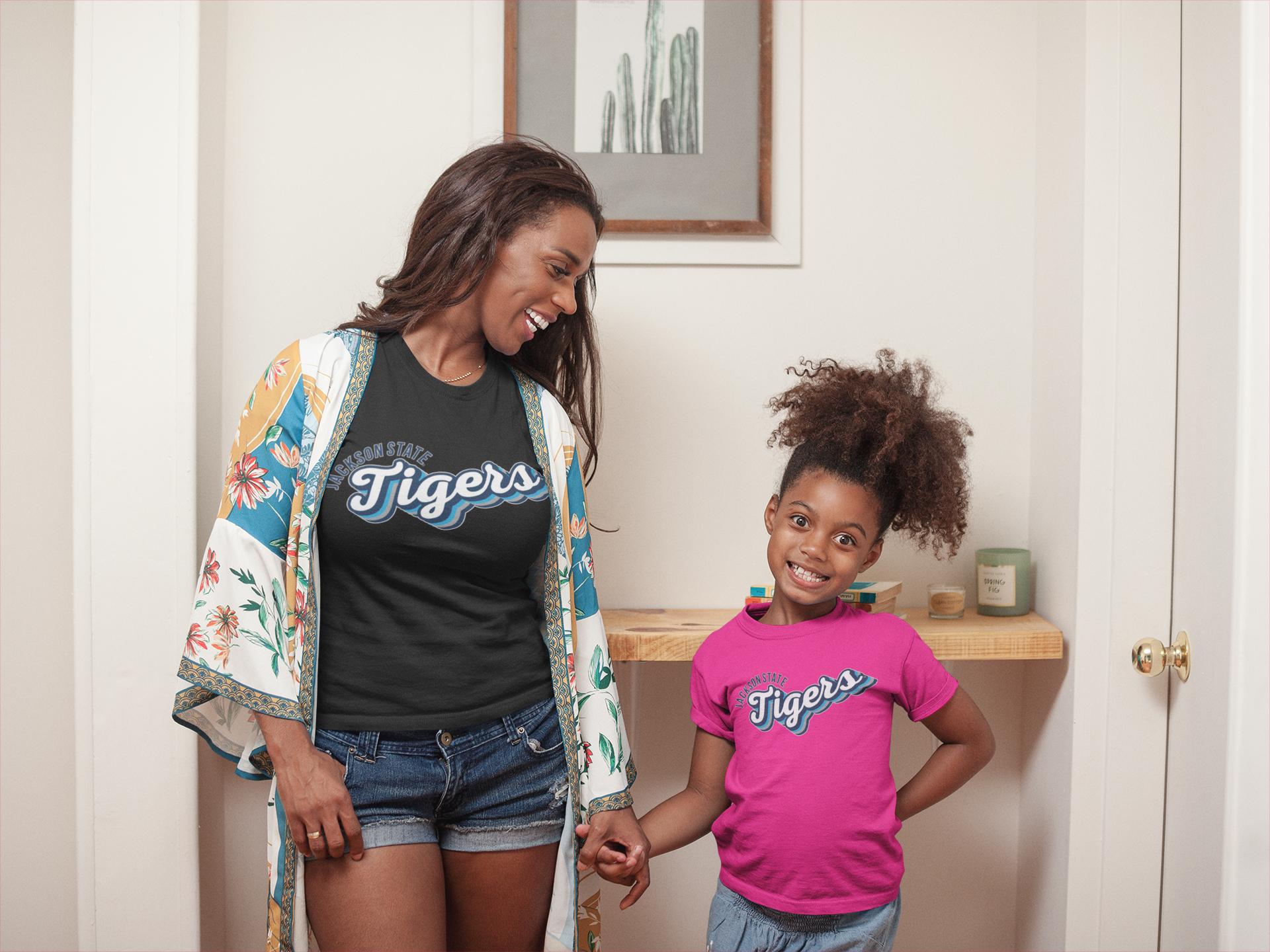 Youth t-shirt with pink tiger graphic on the front