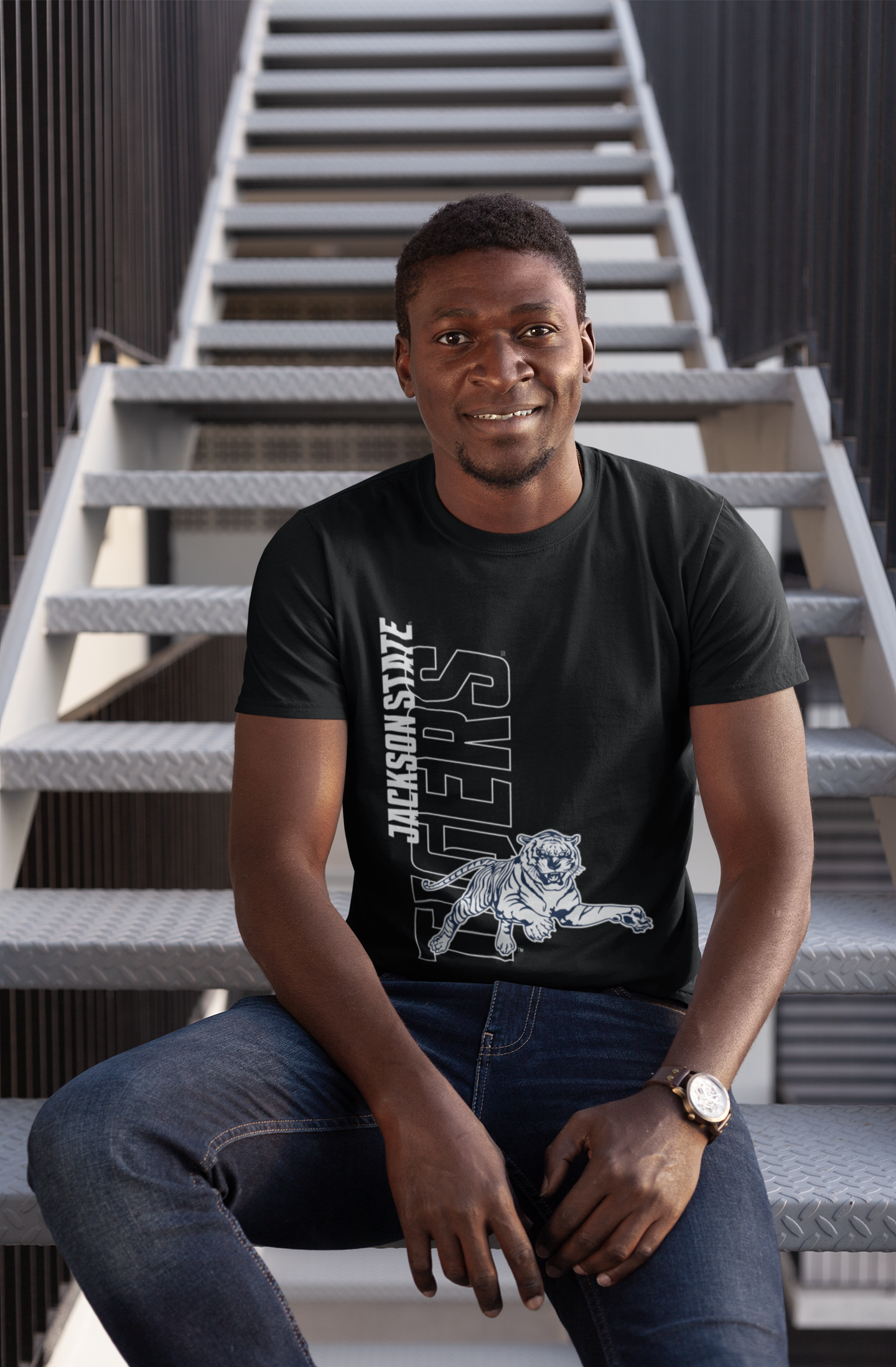 Unisex crewneck black T-shirt with Jackson State tiger logo graphic on chest