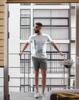 Unisex crewneck T-shirt in athletic heather gray with leaping tiger graphic and large text