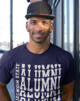 Navy crew-neck short sleeve T-shirt with white stacked “Alumni” graphic on model