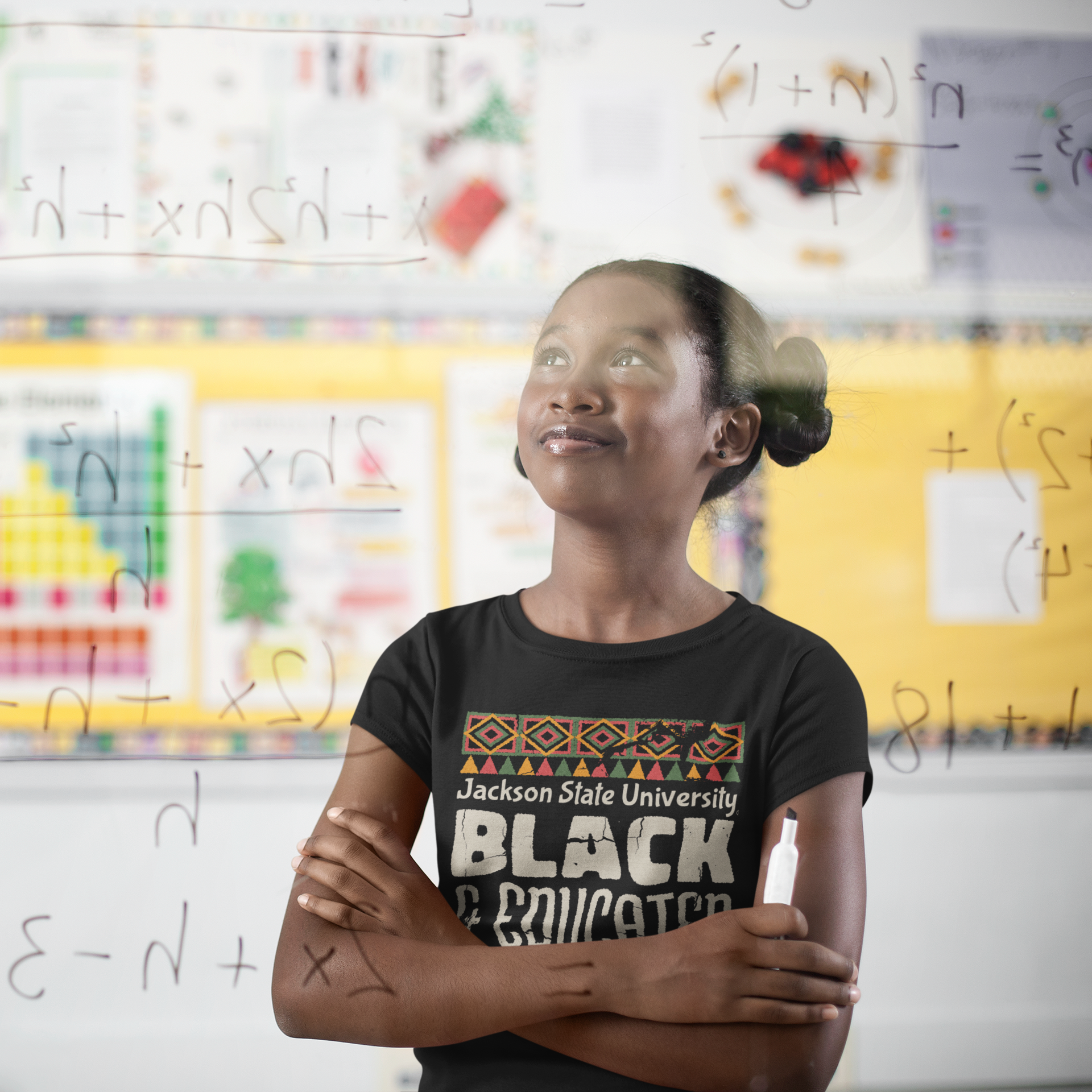 Black crew neck short sleeve T-shirt worn by a child with 'BLACK &amp; Educated' text logo.
