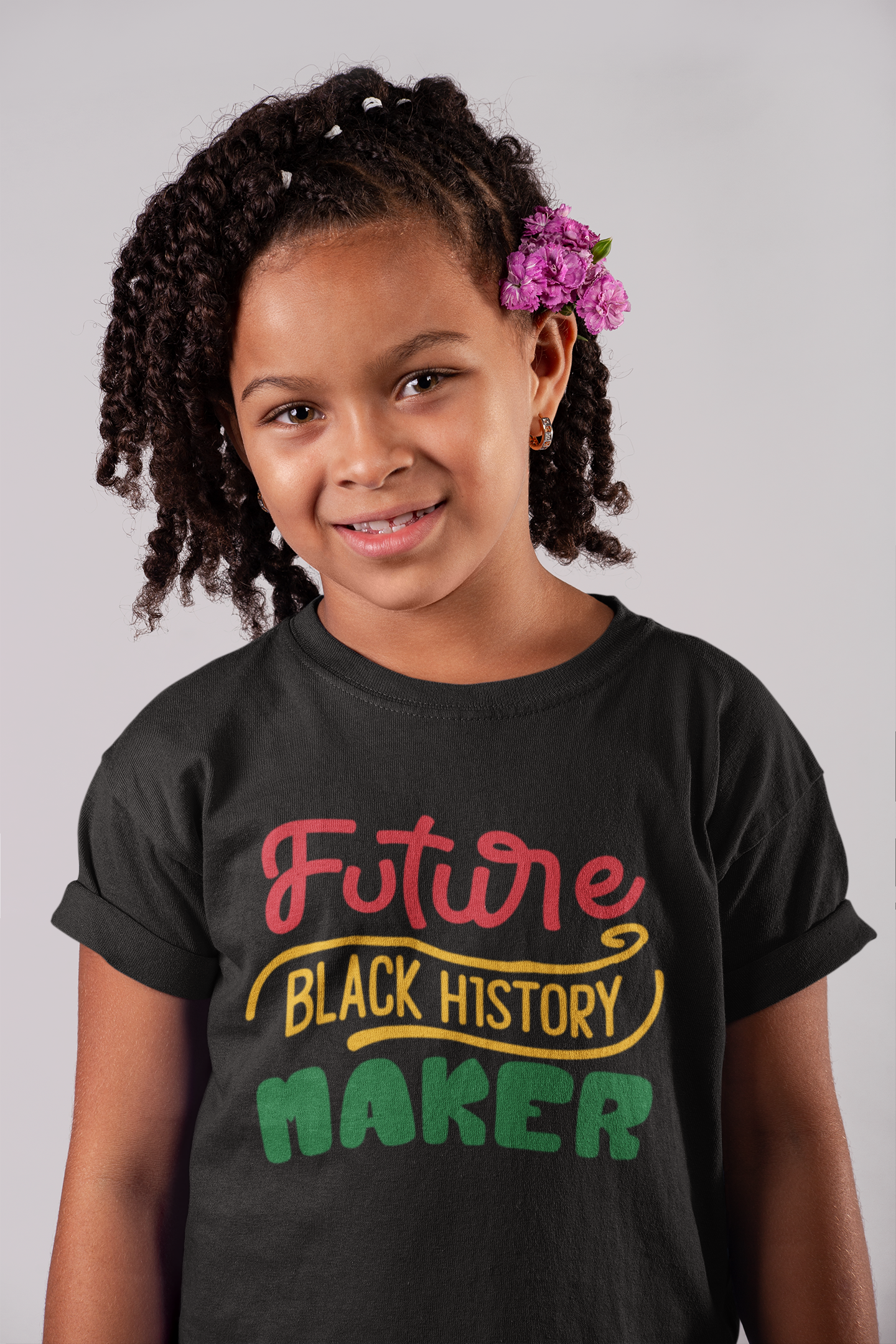 Kids short sleeve T-shirt in dark charcoal with 'Future Black History Maker' front graphic