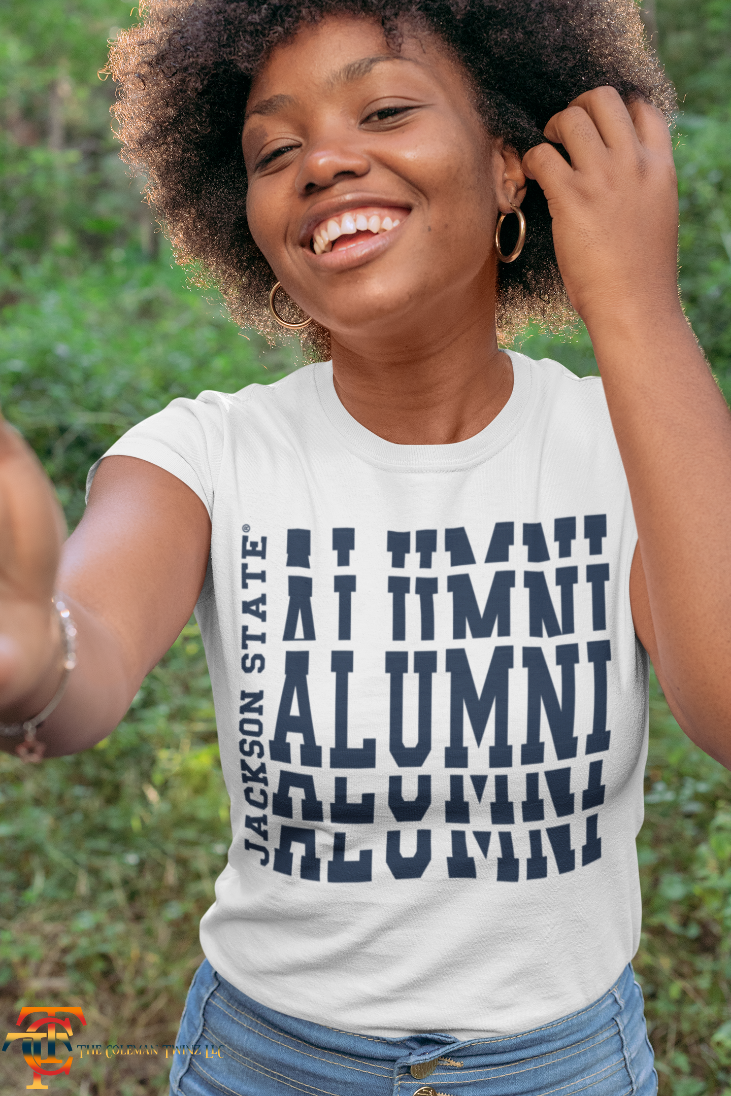 White sleeveless top with stacked alumni logo print on front