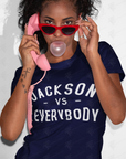 Navy short sleeve crewneck T-shirt with white “JACKSON vs EVERYBODY” lettering.
