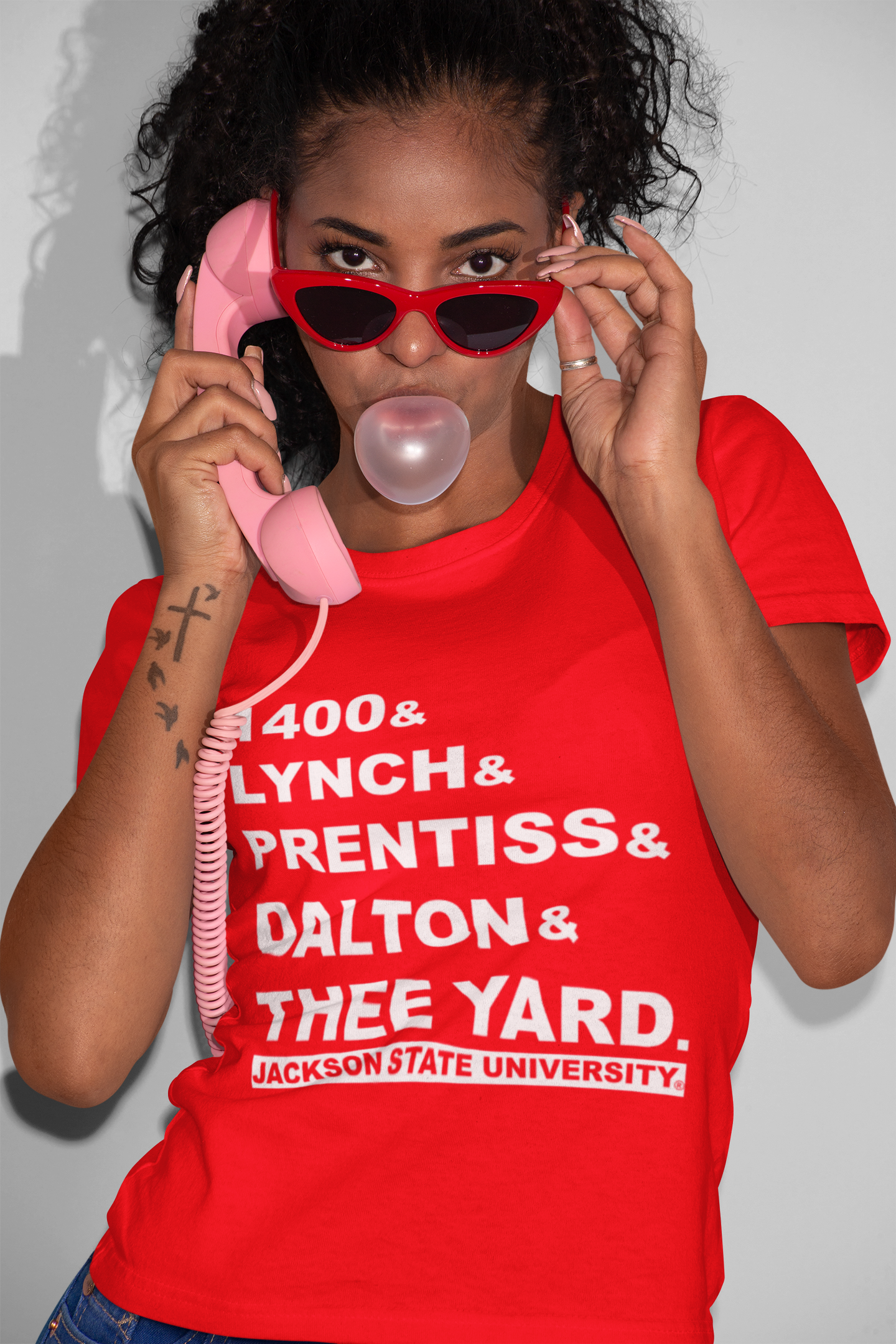 Red crewneck T-shirt with large white graphic text