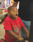 Red kids T-shirt with “I Paused My Game To Celebrate Juneteenth” front graphic