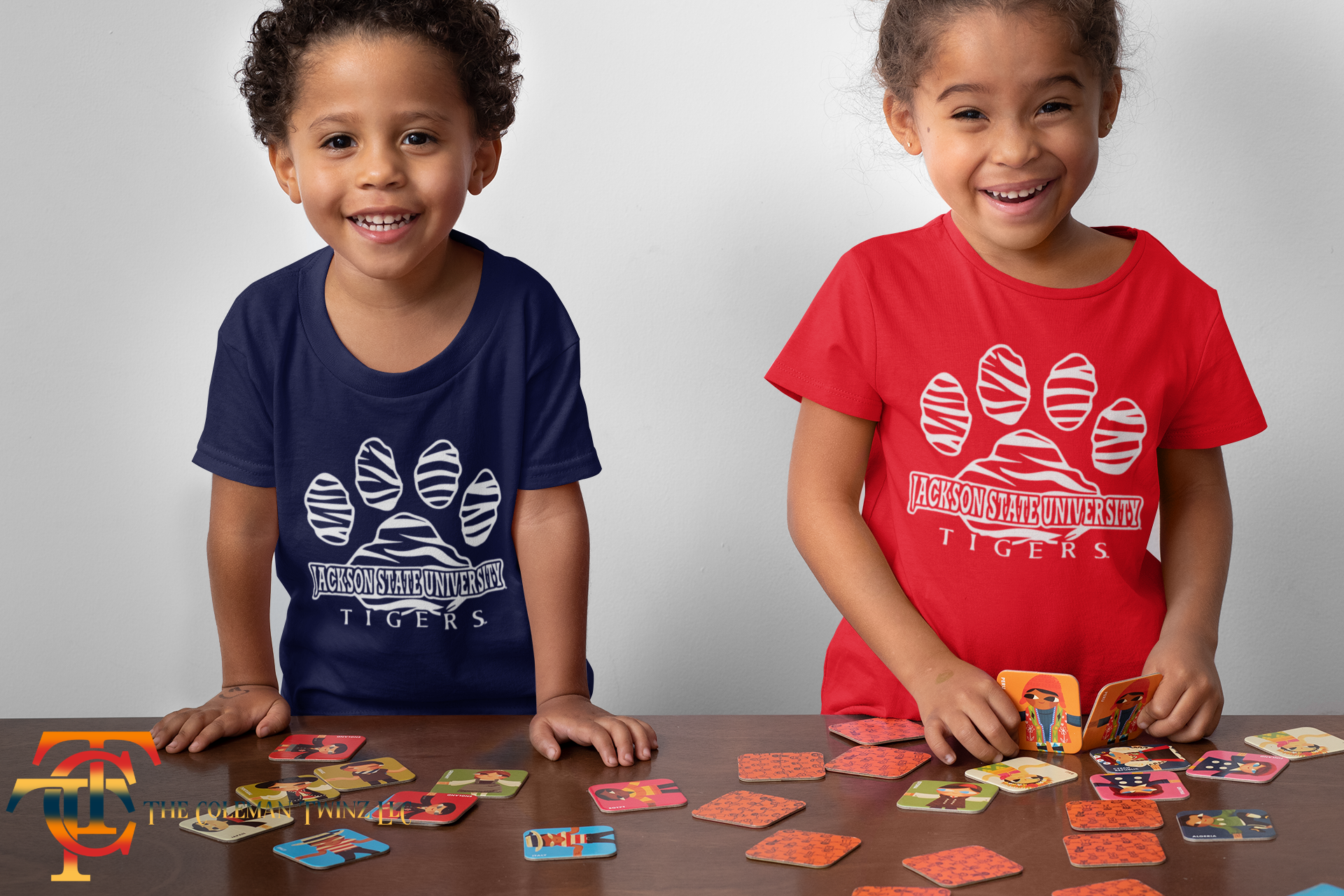 Navy and red toddler short-sleeve T-shirts, each with Tigers paw logo graphic