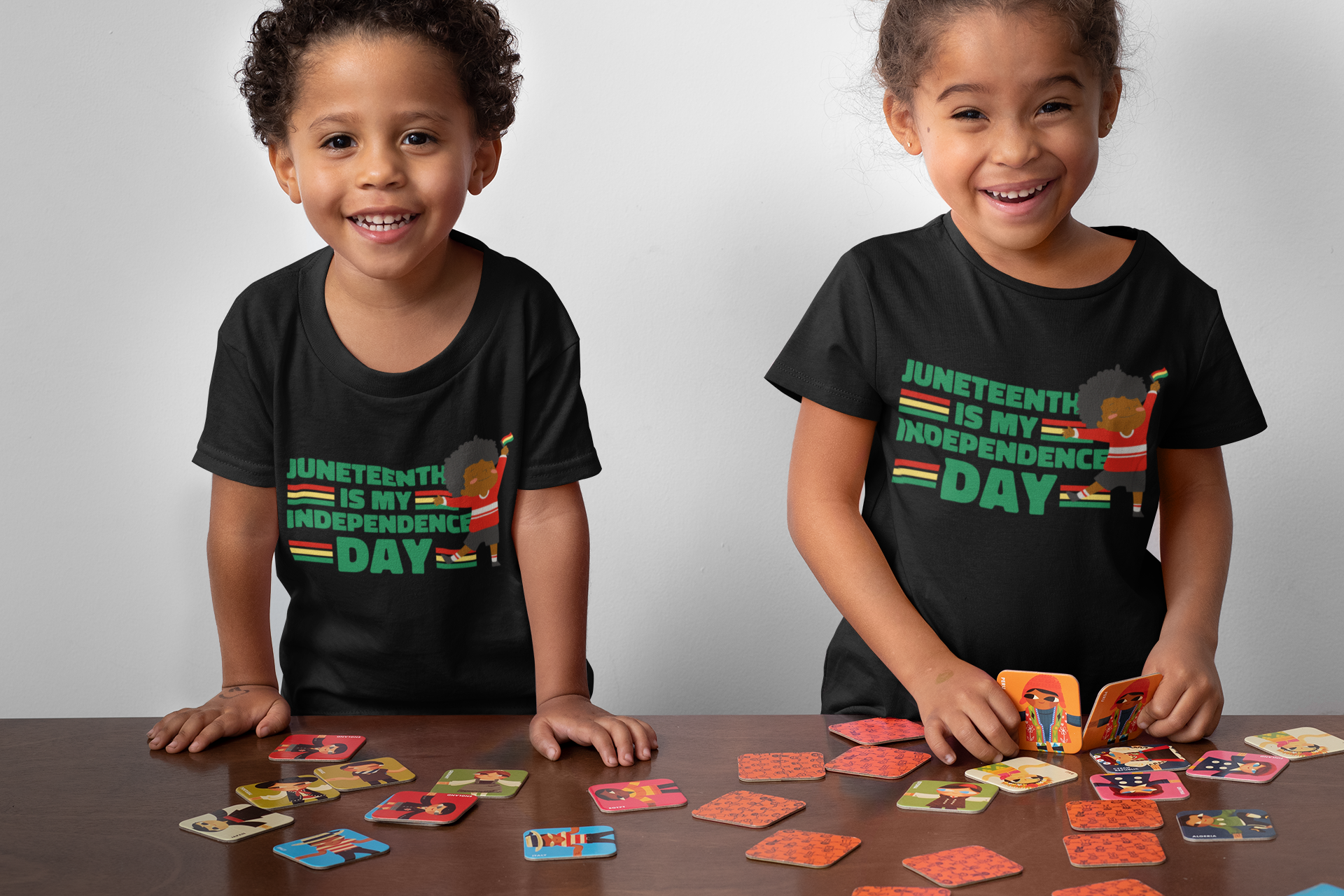 Kids' Juneteenth T-shirt in black with colorful Independence Day graphic