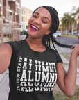 Black crew-neck short sleeve T-shirt with white stacked “Alumni” graphic on model