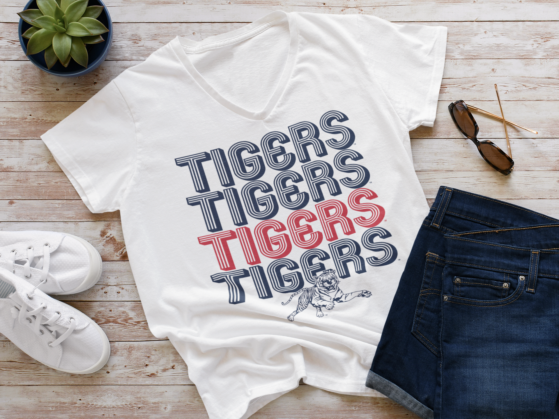 White v-neck short-sleeve t-shirt with striped Tigers lettering and tiger graphic
