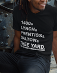 Black v-neck T-shirt with 'THEE YARD' front text graphic