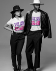 Black v-neck T-shirt with large "Stop the Violence" front graphic worn by model