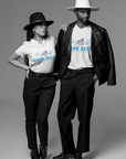 Unisex V-neck t-shirt with “Code Blue” graphic, worn in dark and white by models.